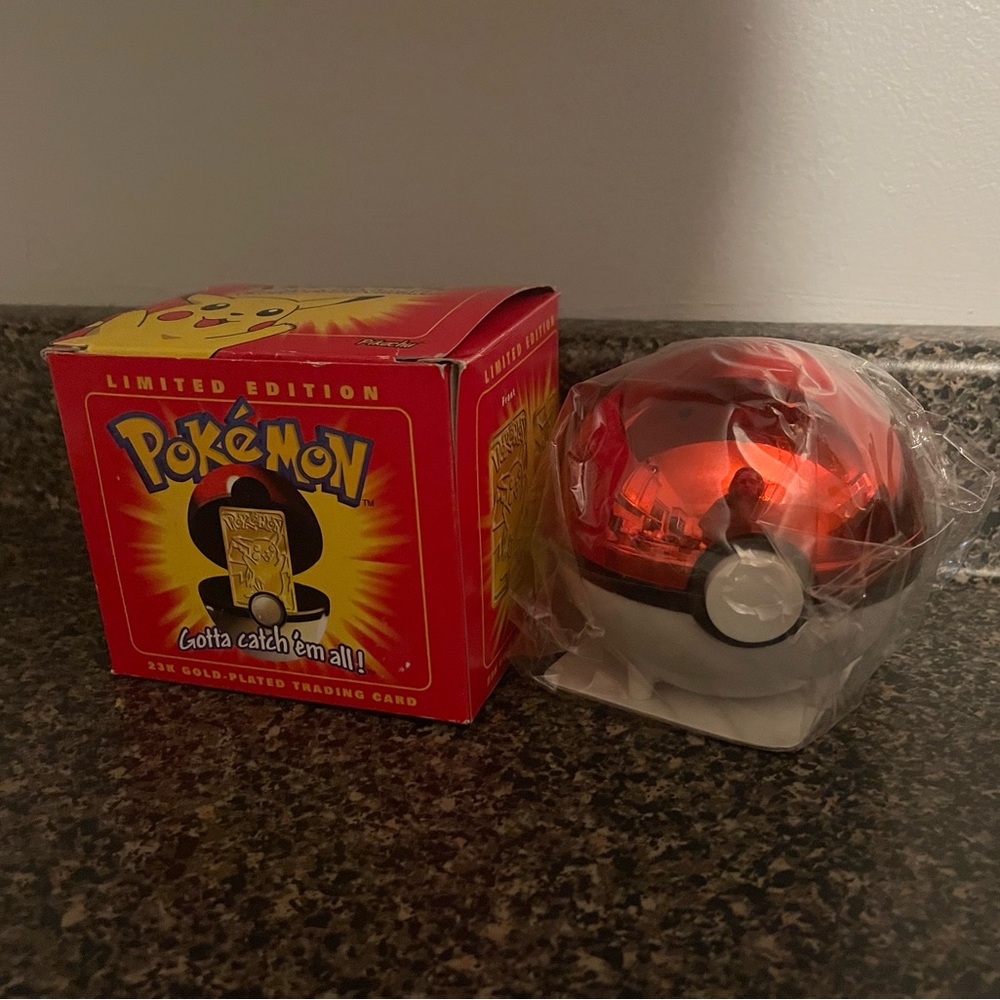 Pokémon gold platted poke ball with authenticity card - unopened
